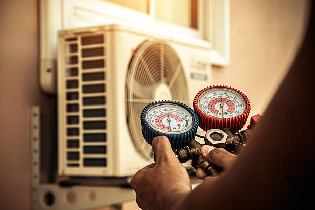 Professional Air Conditioning Service technician working in Winslow, AR